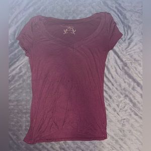 Woman’s deep V-neck shirt